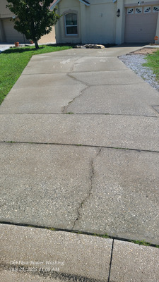 Driveway Pressure Washing And House Soft Washing Project in Sanford FL 32771