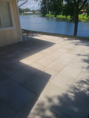 Back Patio Cleaning And Gutter Maintenance Service Project in New Smyrna Beach FL 32168