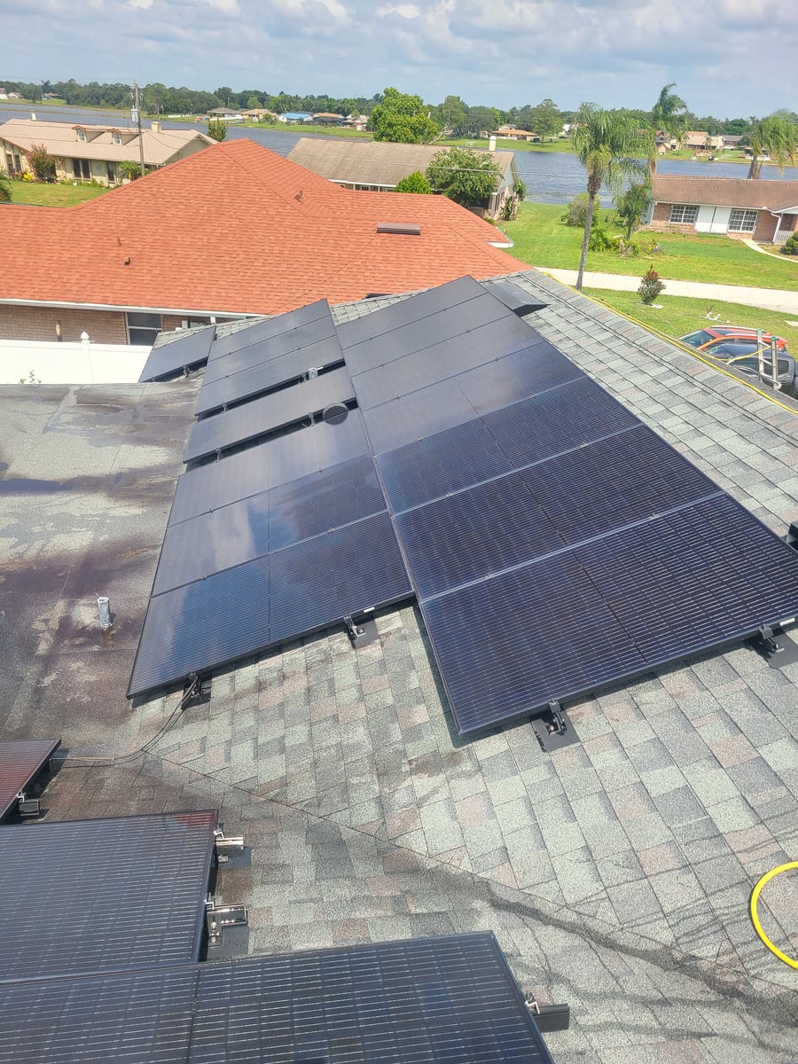 Solar panel cleaning with purified water on residential rooftop Deltona FL 32738