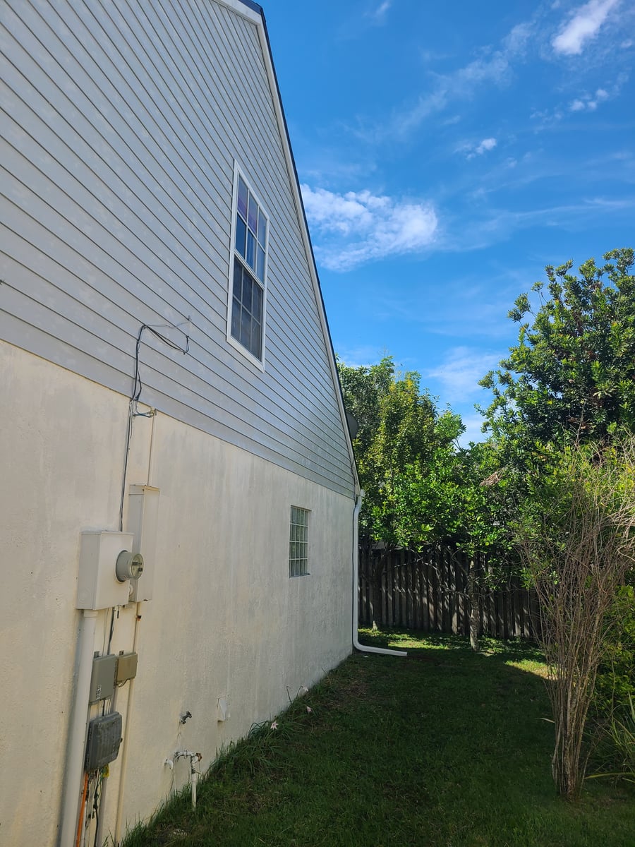 Exterior siding soft washing and surface cleaning for painting