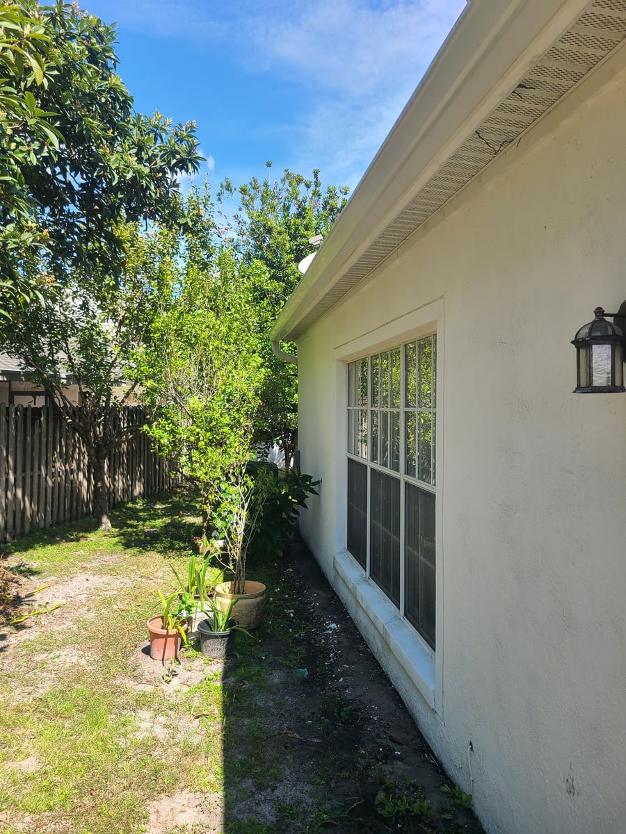 Exterior siding soft washing and surface cleaning for painting