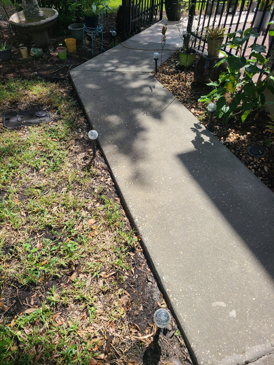 Driveway and walkway pressure washing and concrete surface cleaning