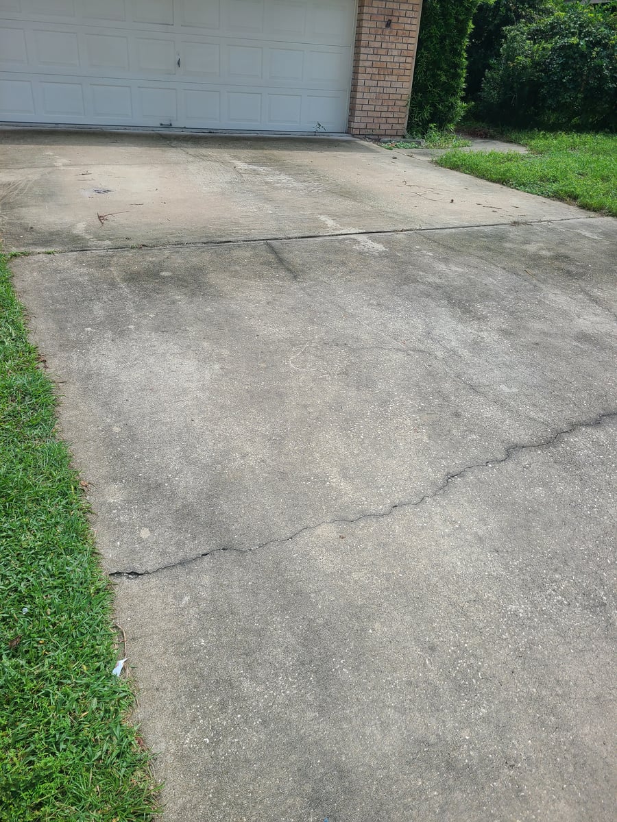 Driveway and sidewalk pressure washing removing mold and grime