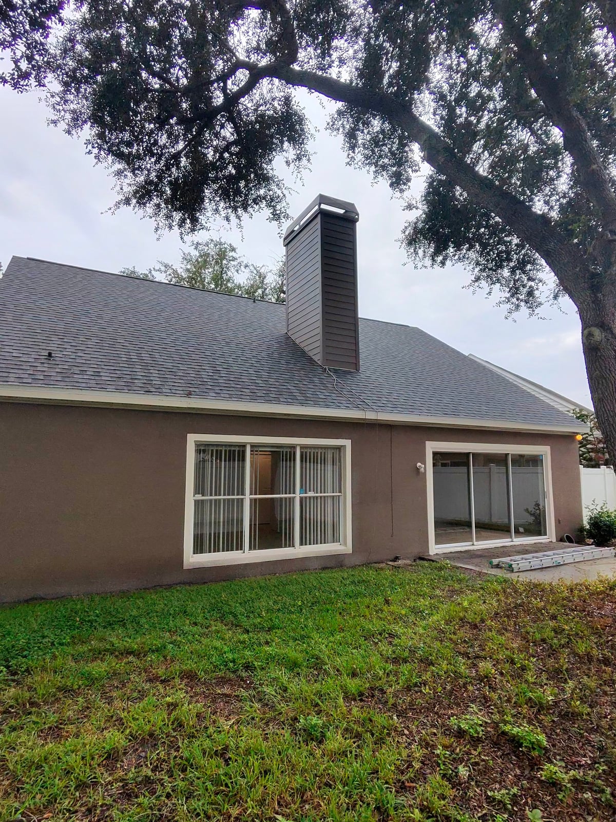Soft washing exterior siding soffits trim and chimney Lake Mary FL 32746