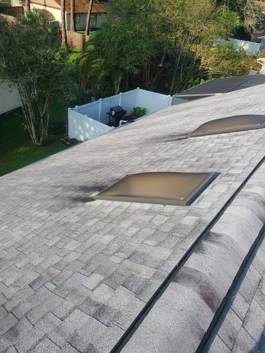 Soft wash roof cleaning and algae moss stain removal