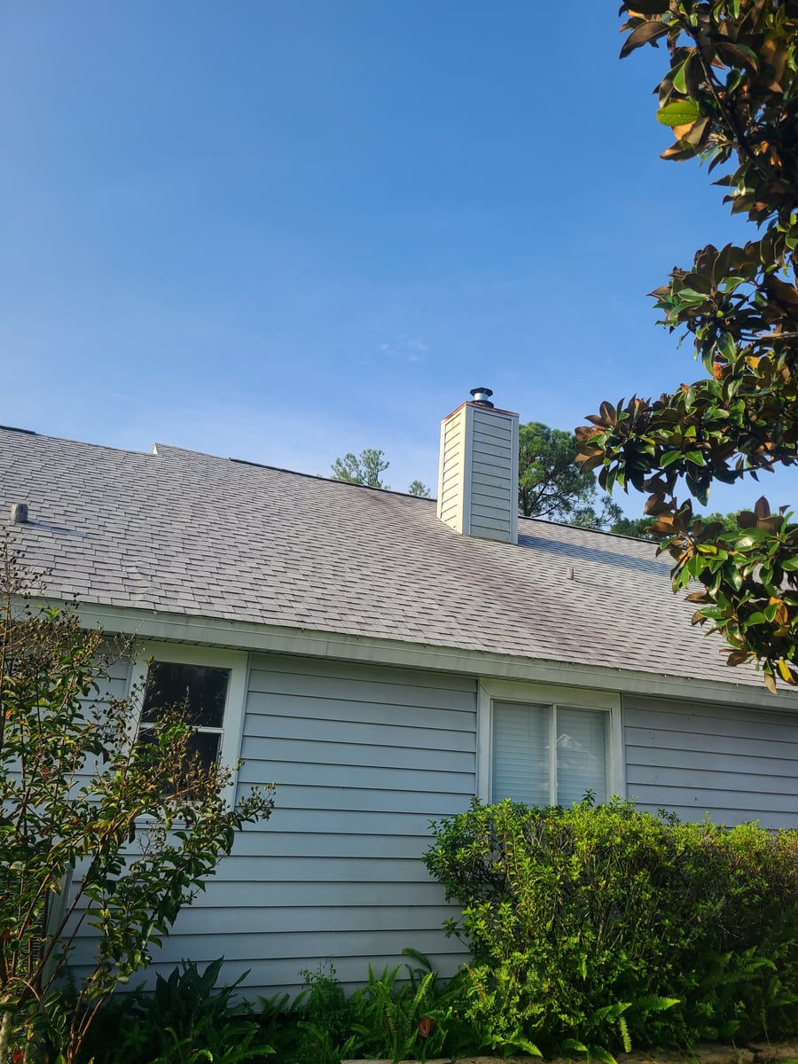 Soft wash roof cleaning and algae moss stain removal