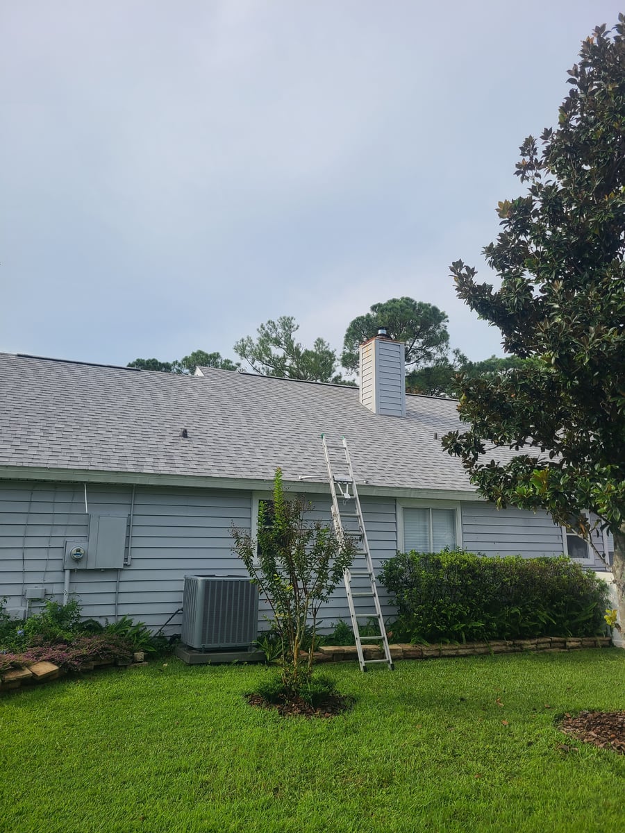 Soft wash roof cleaning and algae moss stain removal